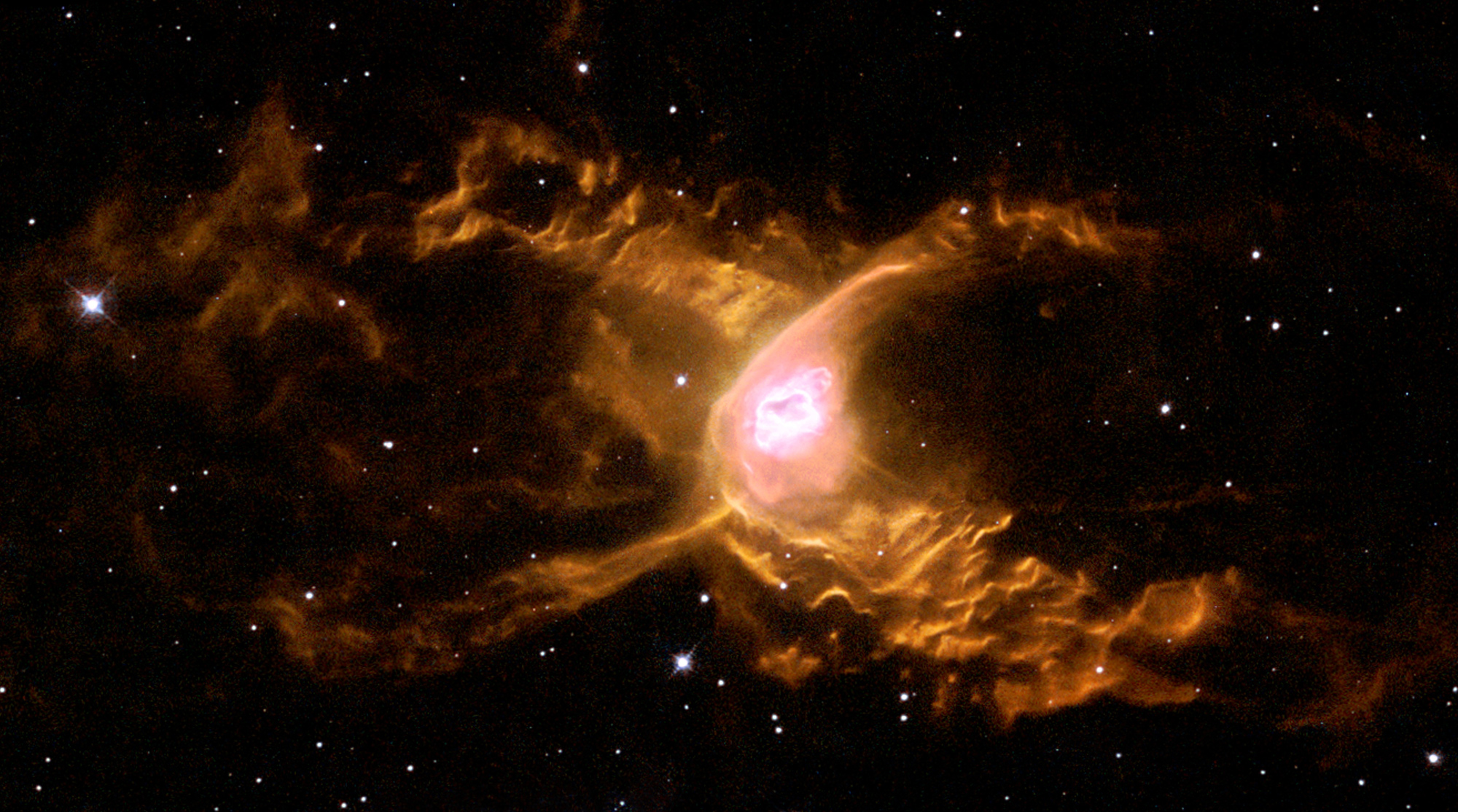 Red Spider Nebula Haunts Deep Space in Hubble Photo